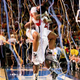 Chane Behanan and Montrezl Harrell of the Louisville Cardinals celebrate after winning against the Michigan Wolverines during the 2013 NCAA Men's Final Four Championship at the Georgia Dome in Atlanta, April 8, 2013
Streeter Lecka/Getty Images